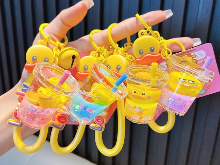 Wholesale Vitality Little Yellow Duck Into The Oil Milk Tea Cup Keychain Liquid Quicksand Pendant Online Hot Sale